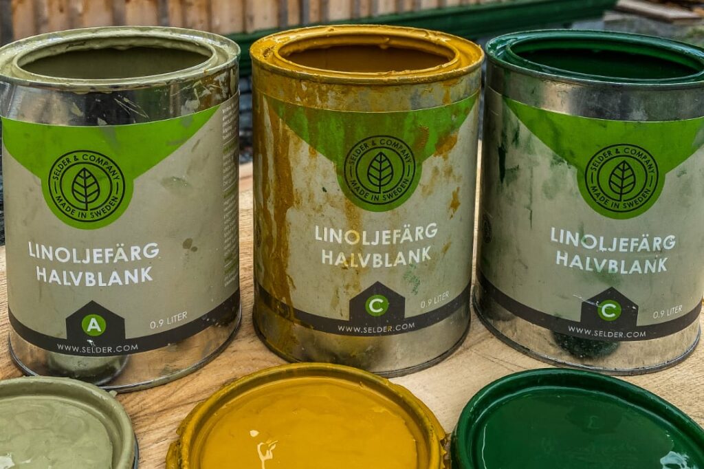 Image of jars full of linseed oil paint